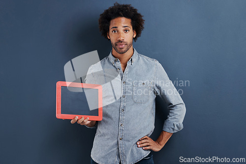 Image of Blackboard, portrait or man with mockup in studio for news, announcement or offer on blue background. Frame, presentation or face of guy model show space for promotion, info or sign up, guide or deal