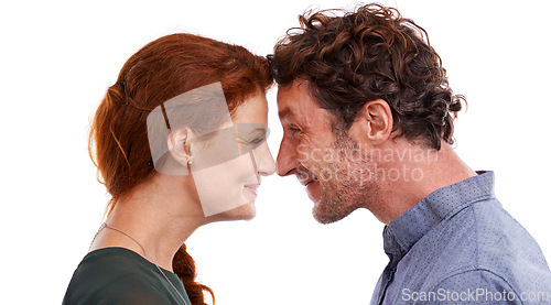 Image of Couple, nose touch and love in studio, romance and smile for relationship on white background. Happy people, commitment and trust in security of marriage, bonding and affection for anniversary