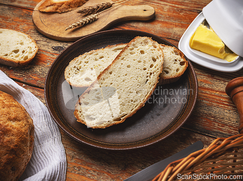 Image of Freshly sliced piece of artisan bread