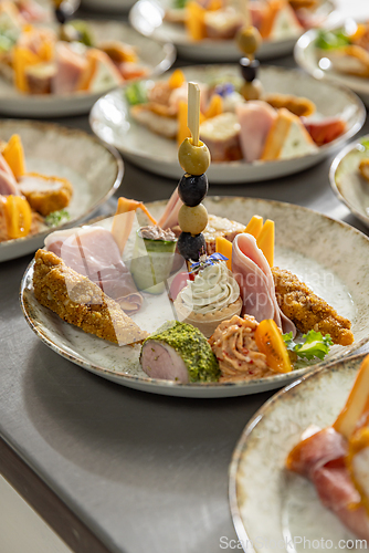 Image of Elegant arrangement of appetizers on a plate