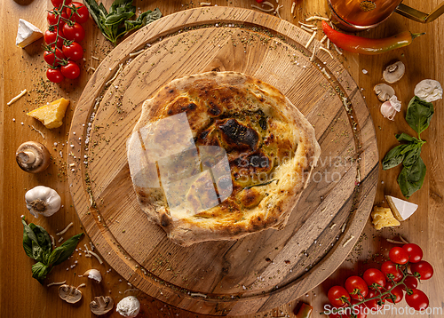 Image of Delicious focaccia on wooden table