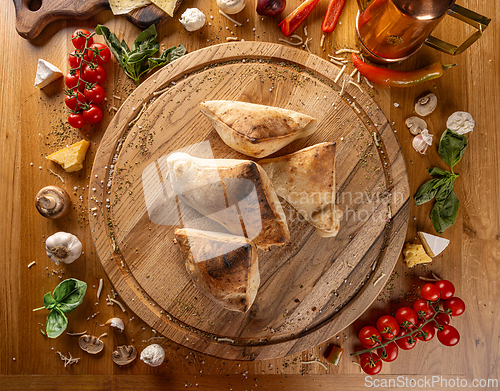 Image of Rustic homemade calzones