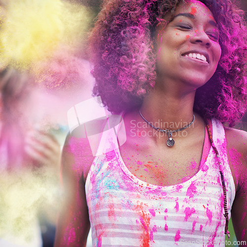 Image of Powder, paint and woman at color festival in park, happiness and fun with celebration or party outdoor. Freedom, excited and colorful mess, smile with joy and culture, positivity and summer event