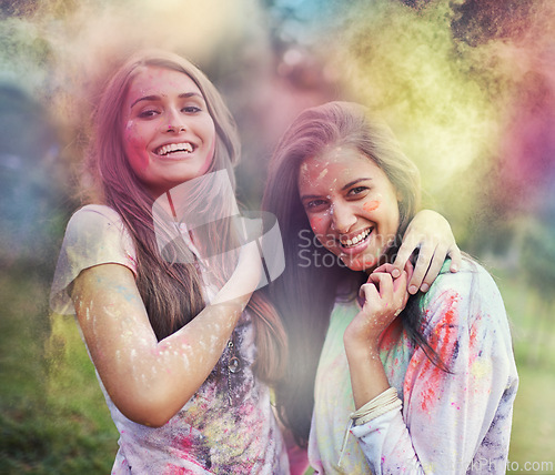 Image of Paint, splash and portrait of women at color powder festival for fun, experience or bonding. Travel, freedom or face of lady friends in India for Holi, celebration or colorful street party tradition