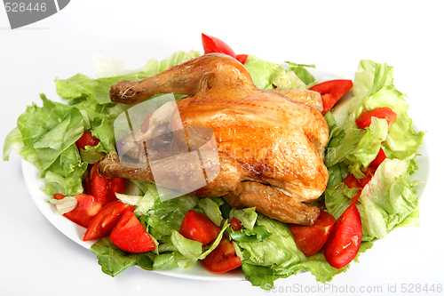 Image of Roast chicken on a bed of salad