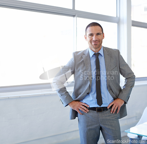 Image of Office, window and confident portrait of man in conference room for business as realtor in London. Professional, entrepreneur and expert real estate agent for development in corporate property