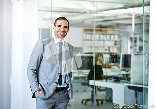 Image of Confident, portrait and man in conference room at office for business as realtor in London with happiness. Professional, entrepreneur or expert real estate agent for development in corporate property