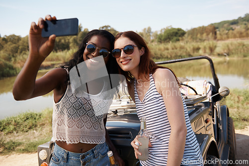 Image of Women, selfie and vacation on road trip by lake, memory and travel adventure for social media in nature. Ladies, cellphone and profile picture in van on holiday, care and bonding together outdoor