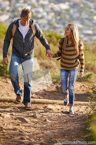 Image of Hiking, freedom and couple in nature, happy and bonding for holiday, vacation and trip to Amsterdam. Outdoor, man and woman together for love for anniversary of girl and male person holding hands