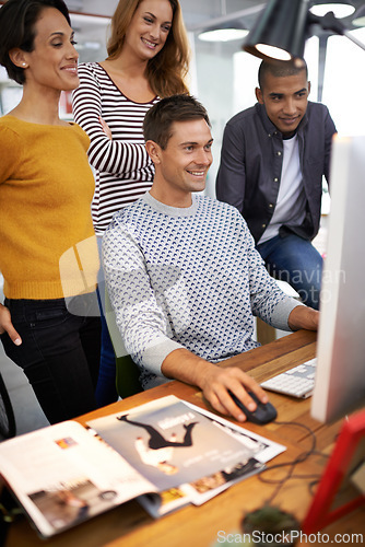 Image of Business people, computer and collaboration on magazine project in office, smile and teamwork. Colleagues, creative agency and internet for planning, designers and website for research on ideas