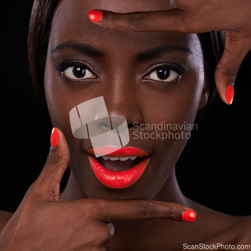 Image of Black woman, lipstick and nail polish with hands for beauty cosmetics and surprise with bright makeup on dark background. Portrait, wow and orange lip balm with manicure, frame and cosmetology