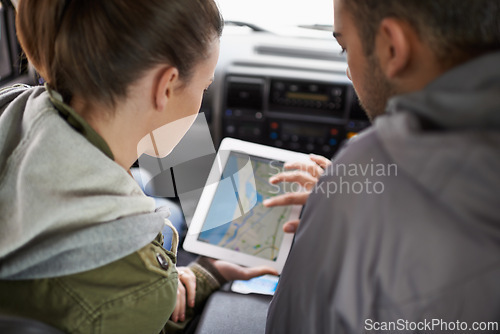 Image of Couple, car and map on road trip with navigation for direction, vacation and travel to destination in countryside. Woman, man and tablet in vehicle for tech or location to holiday journey and tourism