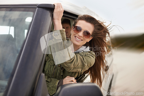 Image of Woman, fun or car window as excited on road trip or getaway for travel and leisure in New Zealand. Smile, female person or traveler on driving holiday in motor transport as journey of exploration