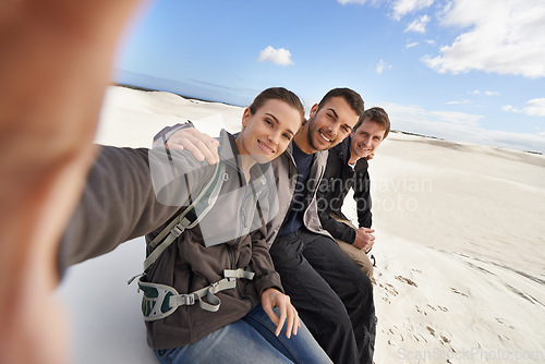 Image of Friends, smile and selfie in desert for adventure on holiday, road trip and travel together in California. People, happy and excited in sand dunes for vacation or break with bonding for memory.