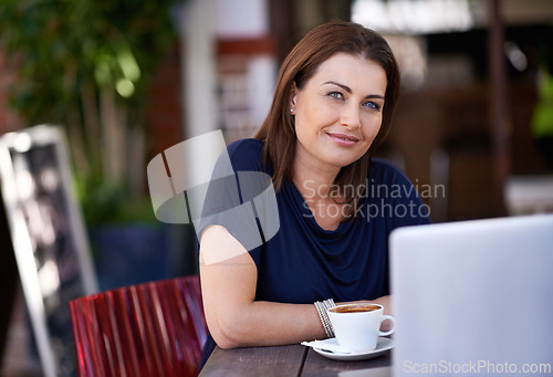 Image of Cafe, portrait and woman with laptop for remote work as writer of blog and online communication. Happy, journalist and internet research for article at coffee shop with espresso, latte and computer