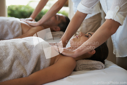 Image of Massage, relax and couple in spa for touch, wellness and therapy on holiday or vacation for break and pamper. Young people and lay with head on towel for holistic care and peace for calm on table