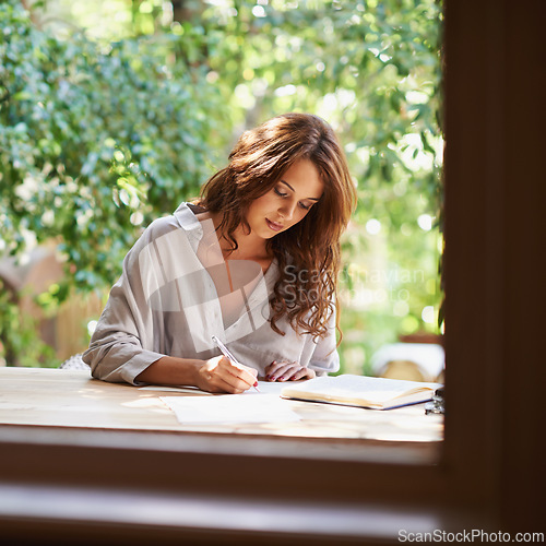 Image of University student, woman and write notes to study for revision, exam preparation at home. Female person outdoor and diary with test or assignment deadline and schedule for distance learning