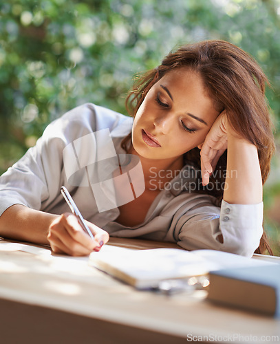 Image of Student, woman and write notes to study with books for revision, exam preparation at home. Female person outdoor and diary with test or assignment deadline and schedule for distance learning.