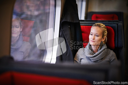 Image of Woman, travel and thinking on train for holiday with adventure, trip and leisure with journey in France. Female person, commute and vacation on public transport as tourist for break and destination