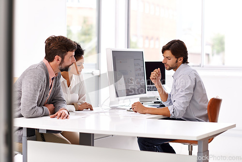 Image of Business people, meeting and manager working with staff at desk for planning and web consultancy. Teamwork, discussion and management of team with professional conversation for company project