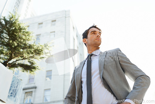 Image of Businessman, city and buildings with thinking for accounting, career or business in Los Angeles. Professional man, entrepreneur and vision with confidence for opportunity mindset and ambition