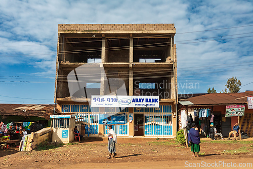 Image of Abay bank on Ethiopian street and local people on the street. Every person in Ethiopia own bank account