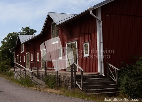 Image of traditional typical finnish red wooden warehouse