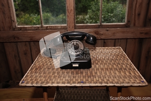 Image of black vintage rotary telephone