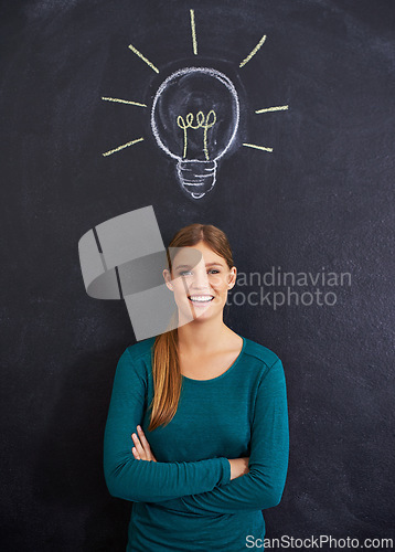 Image of Idea, portrait and woman with light bulb on chalkboard for inspiration, brainstorming and problem solving. Creative, question and person on background with icon for solution, thinking and planning