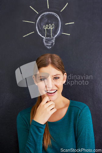 Image of Portrait, thinking and woman with light bulb on chalkboard for inspiration, brainstorming and problem solving. Creative, question and person on background with icon for ideas, thoughtful and planning