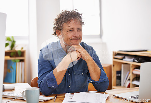 Image of Senior, businessman and thinking with laptop, documents or paperwork for budget planning or finance at office. Mature man, accountant or employee with smile in wonder or thought for financial success