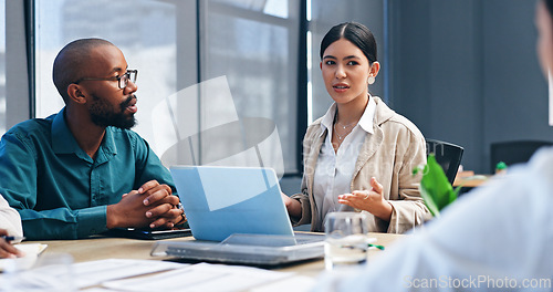 Image of Business people, teamwork and documents in meeting for planning, data analysis and social media statistics at agency. Corporate employees, laptop and group with paperwork, report and strategy for job