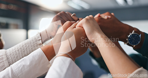 Image of Holding hands, collaboration and support with business team in office closeup for unity or solidarity. Trust, partnership and community with employee group in company workplace for togetherness