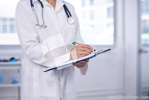 Image of Hospital, writing and hands of doctor with documents for surgery, compliance or insurance info closeup. Healthcare, folder or nurse with pen for admin, paperwork or clinic, schedule or checklist
