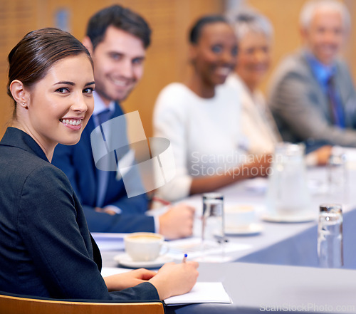 Image of Happy woman, portrait and business with team in boardroom, meeting or discussion at the office. Group of corporate employees with smile for conference, planning or collaboration at the workplace