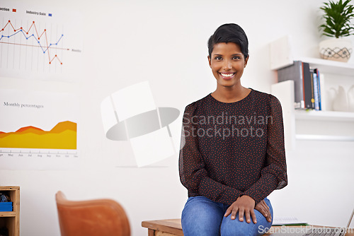 Image of Business woman, portrait or office for online research or productivity or internet to work on finance proposal. Indian person, consultant and happy face in startup for working and laptop for project