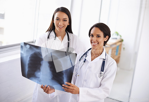 Image of Portrait, x ray and doctors with results in hospital, medical facility or clinic for lung exam. Women, people or healthcare workers with radiology document, research or analysis of respiratory system