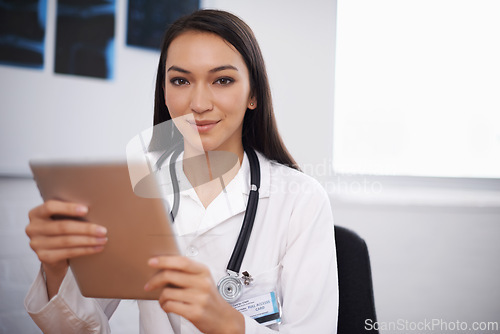 Image of Portrait, doctor and woman with tablet in hospital for healthcare, wellness or telehealth online in clinic. Face, medical and professional with technology, employee and radiology expert in Brazil