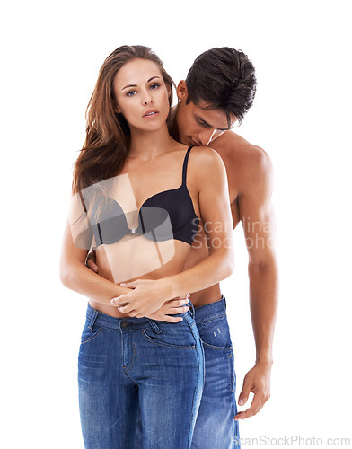 Image of Portrait, hug and couple sexy in studio for love or bonding, close and sultry with seduction for relationship. Man, woman and together on white background for compassion, romance and embrace.