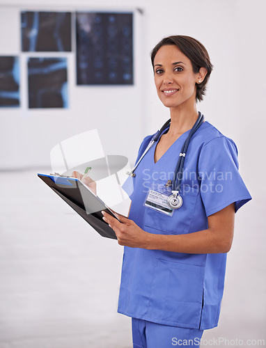 Image of Portrait, nurse and happy woman writing on checklist in hospital for healthcare, wellness and service. Doctor, smile or medical professional with clipboard, surgeon or radiologist in clinic in Brazil