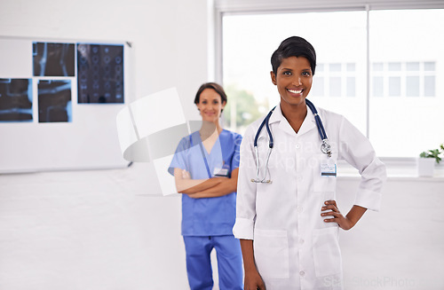 Image of Portrait, leader and smile of medical team in hospital for healthcare, wellness and arms crossed. Happy doctor, nurse and collaboration of professional experts or confident women in radiology clinic