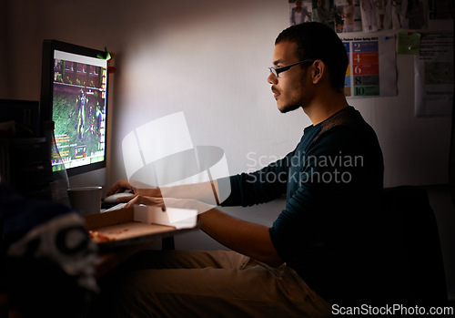 Image of Night, gamer or man with computer, tech or typing with esports or programmer with nerd or geek. Person, home or guy with pc or online competition with dark room or rpg player with network or internet