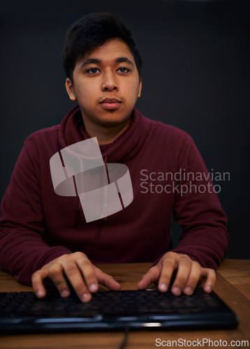Image of Asian man, face and keyboard for coding, programmer and information technology with video game or software development. Internet, computer programming with gamer or developer for cyber security