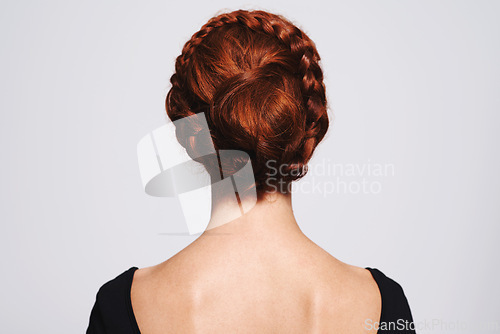 Image of Woman, haircare and hairstyle with redhead in studio on white background with satisfied look and confidence. Back view, female person and routine with natural hair, repair and fresh with treatment