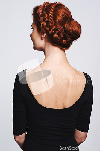 Image of Back view of woman, hair and braid hairstyle for beauty, elegant redhead with glamour and cosmetology on white background. Haircare, luxury or regal, Irish model with plait or twist for cosmetic care