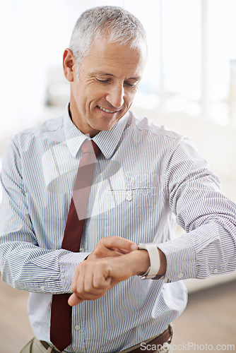 Image of Happy, smile and senior businessman with smartwatch in office for message, notification or text check. Tech, reading and elderly executive with digital watch, schedule or effective time management