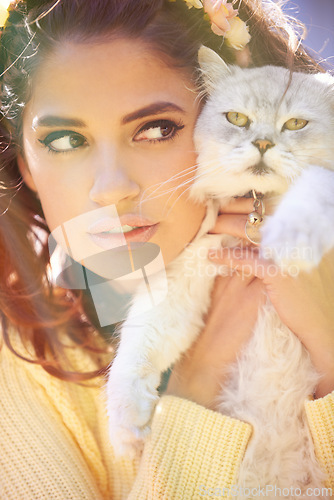 Image of Woman, cat and hug outdoors for comfort, pet care and holding for affection outside. Female person, animal and embrace for bonding on vacation or holiday, love and companion for support in closeup