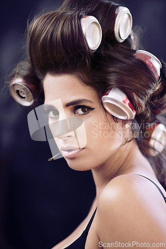 Image of Texture, rollers and woman with hair, portrait and creative for curling with cans for soda on head. Adult, girl and female person with confidence of style, tools and model with aesthetic for pinup