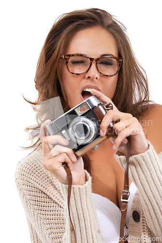 Image of Portrait, wink and woman with camera, vintage and glasses on photographer with creative style. Fashion, art and aesthetic photography with face of girl on white background for flirt, focus and vision