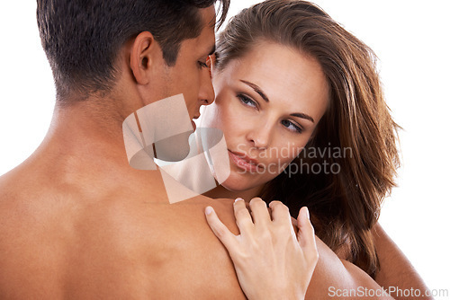Image of Hug, sensual and couple love in studio for care or bonding, close and affection with passion for relationship. Man, woman and together on white background for compassion, romance and embrace.